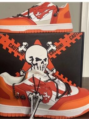 Orange and White Low-Top Sneakers with Graphic Accent